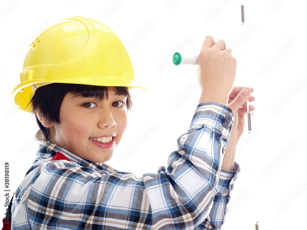 smiling boy wearing construction helmet smiling boy wearing construction helmet