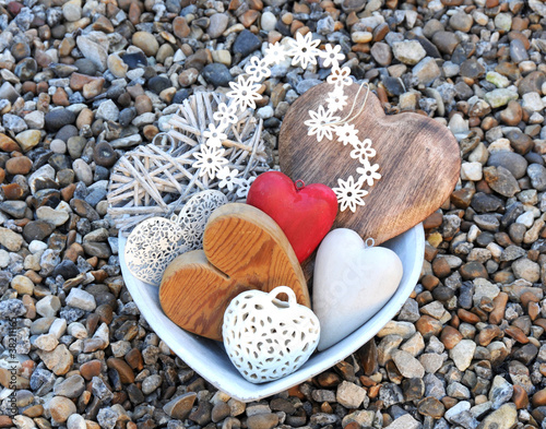 hearts in a bowl on pebbles