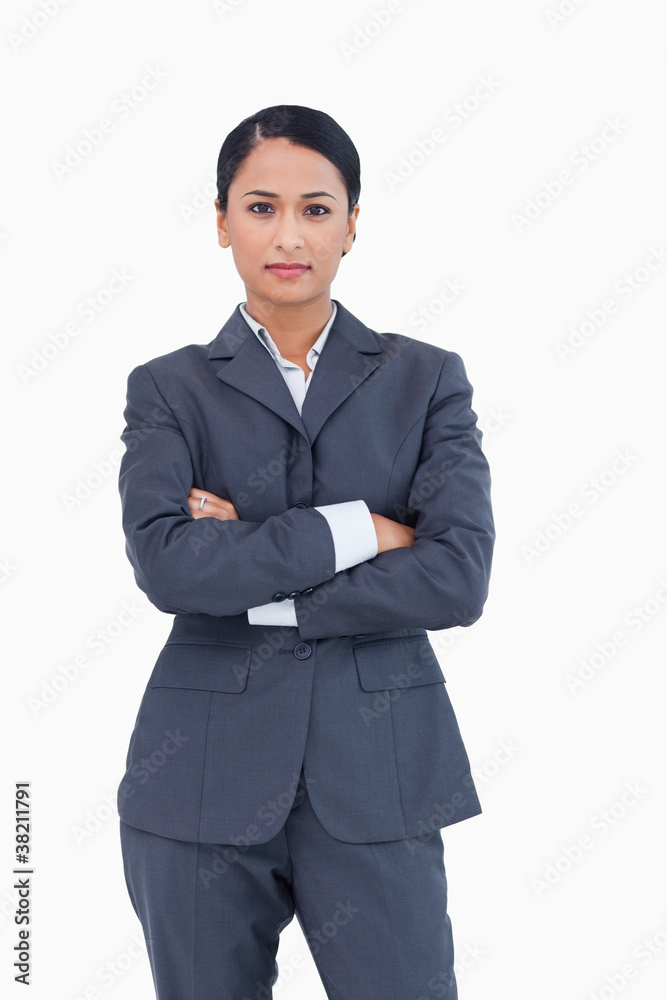 Serious businesswoman with folded arms Serious businesswoman with folded arms