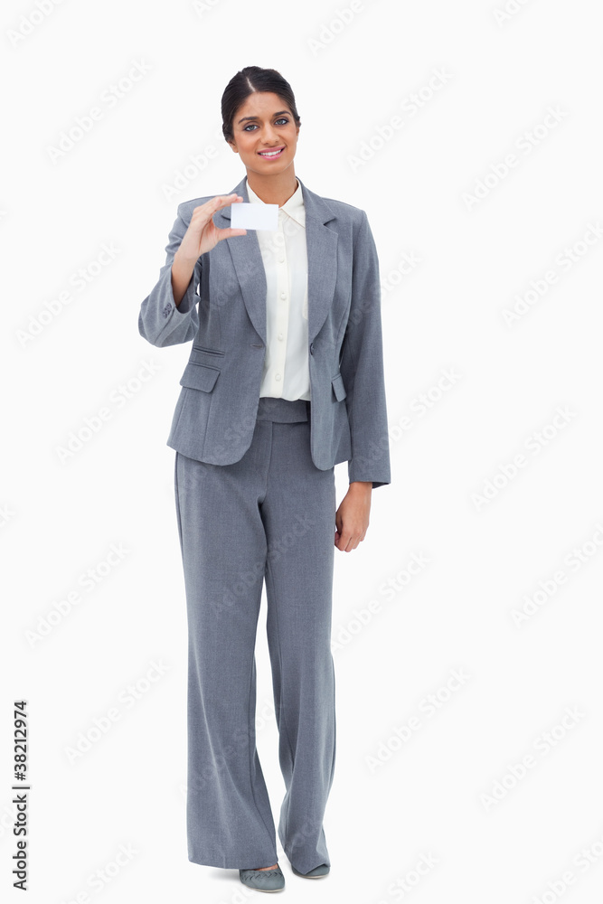 Smiling saleswoman showing blank business card Smiling saleswoman showing blank business card