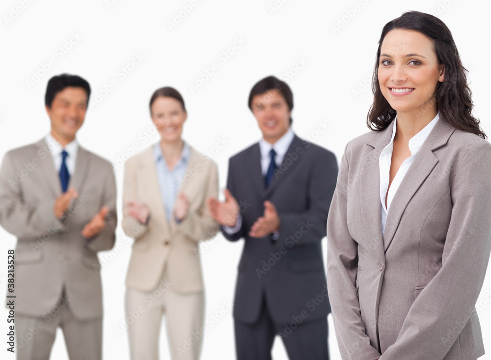 Saleswoman getting applause from her colleagues Saleswoman getting applause from her colleagues