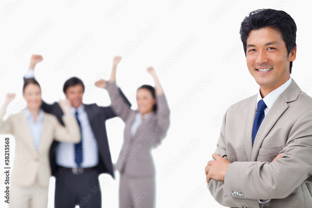 Successful salesman getting celebrated by colleagues Successful salesman getting celebrated by colleagues