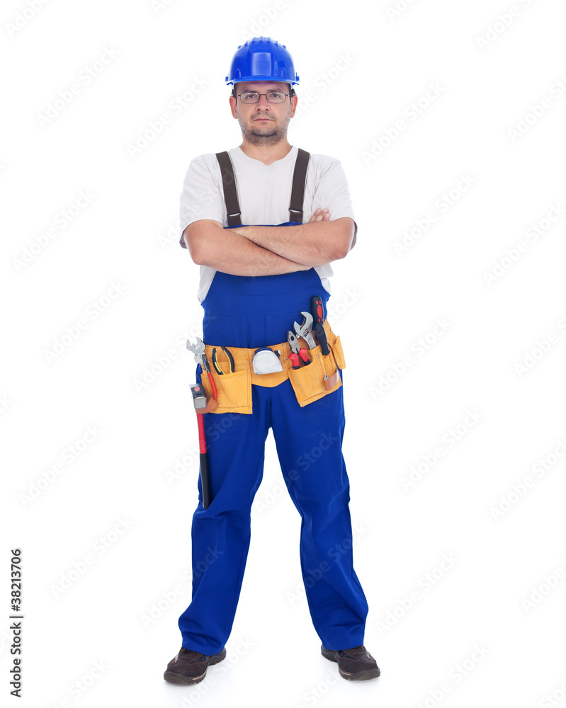 Confident repairman with lots of tools Confident repairman with lots of tools