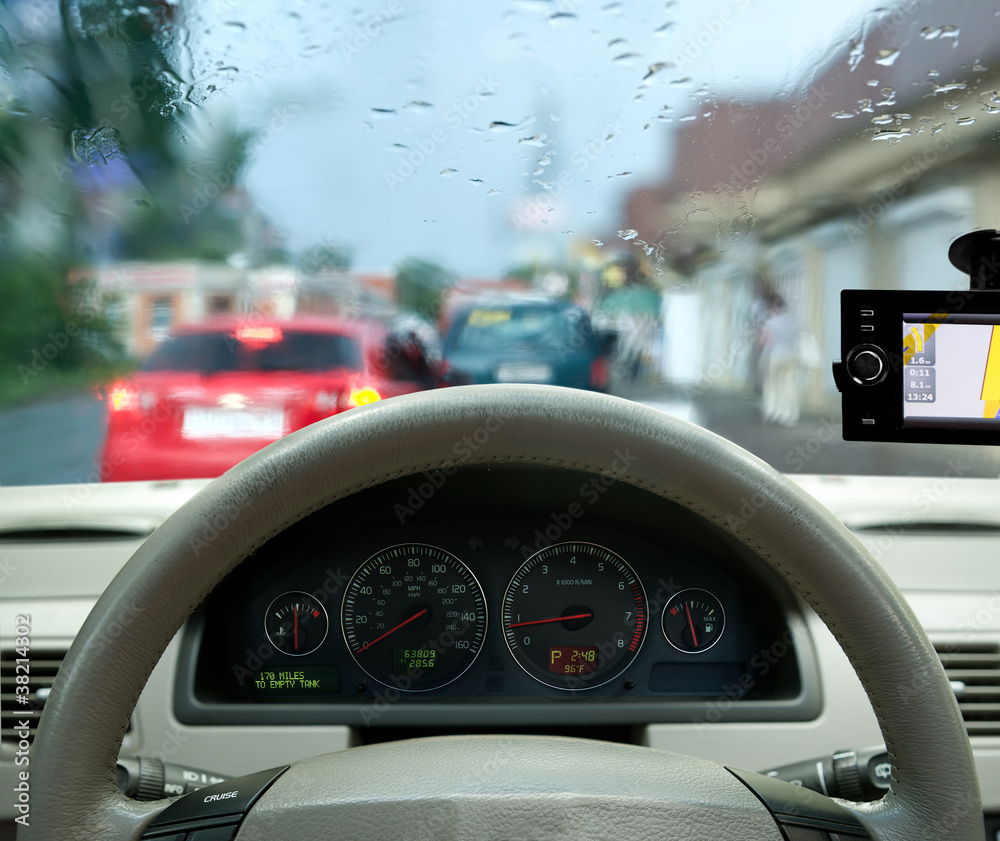 navigation system . car on the road among fields