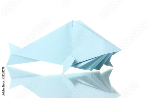 Origami fish out of the blue paper isolated on white