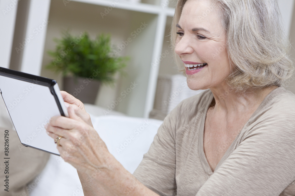 Senior Woman Using Tablet Computer Senior Woman Using Tablet Computer