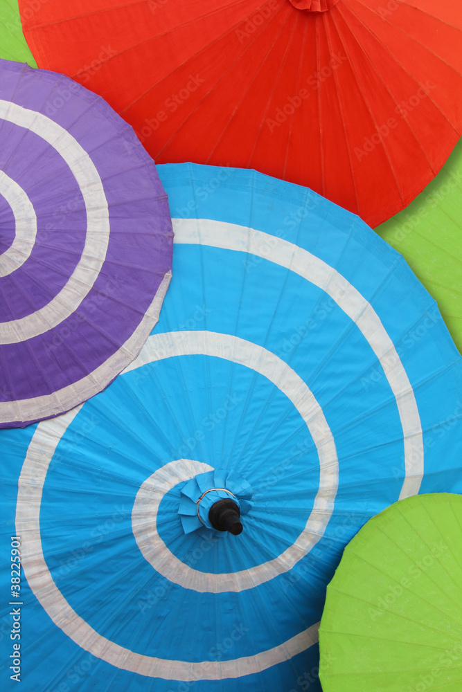 Fototapeta premium A variety of paper umbrellas wide range of sizes.