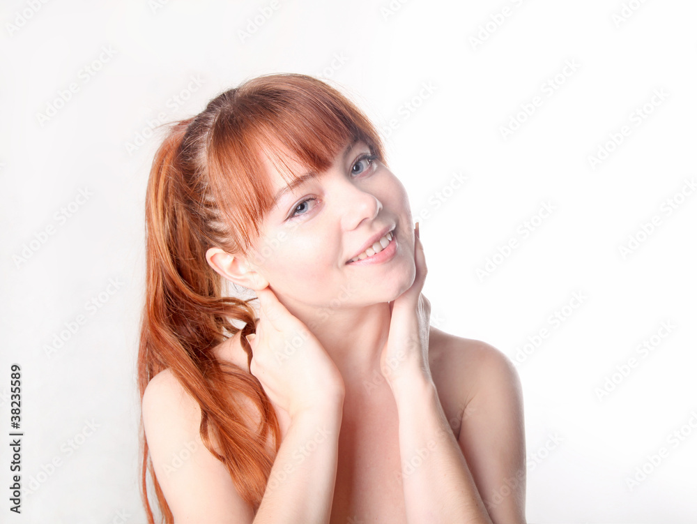 Sensual young smiling woman with beautiful long red hair Sensual young smiling woman with beautiful long red hair