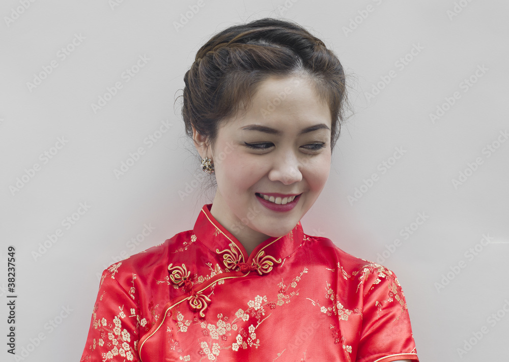 Oriental beauty looking down on white background. Oriental beauty looking down on white background.