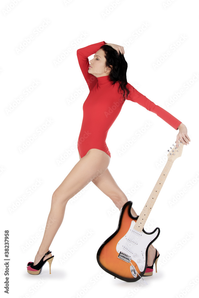 Sexy young female posing with guitar over white Sexy young female posing with guitar over white