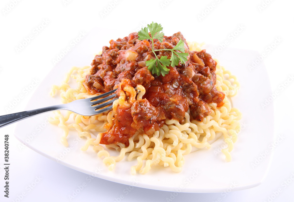 Fusilli bucati lunghi with bolognese sauce being eaten