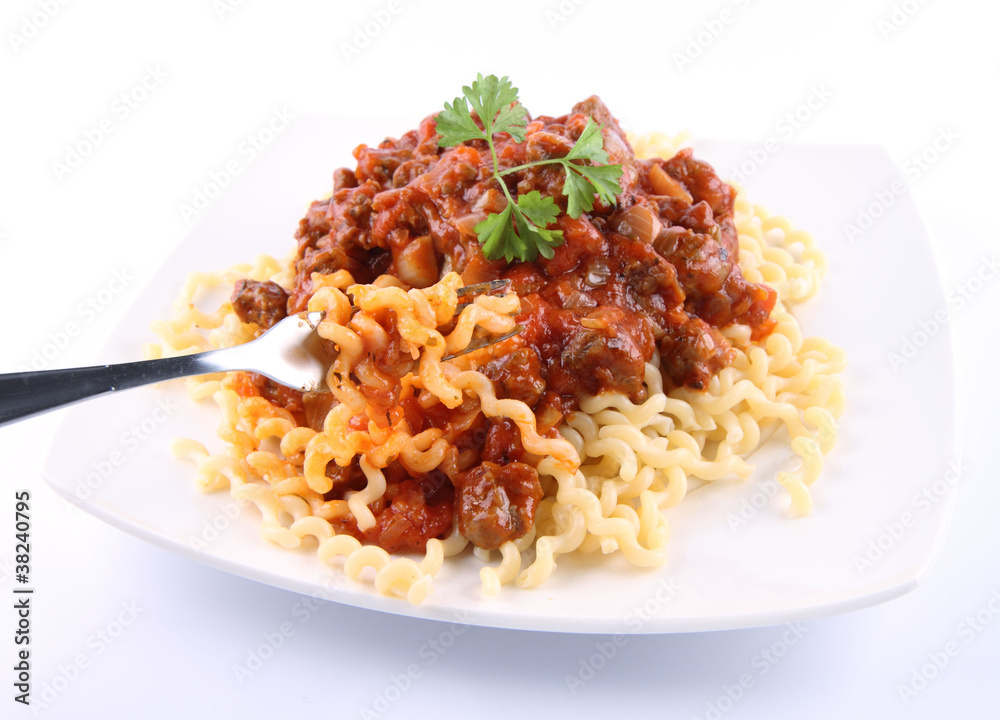 Fusilli bucati lunghi with bolognese sauce on a plate Fusilli bucati lunghi with bolognese sauce on a plate