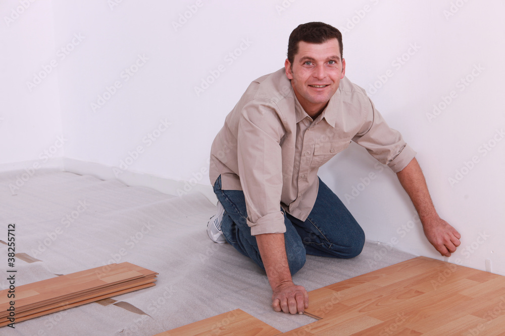 man laying parquet man laying parquet