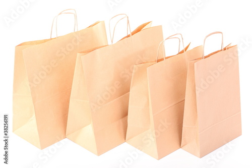 Shopping brown gift bags isolated