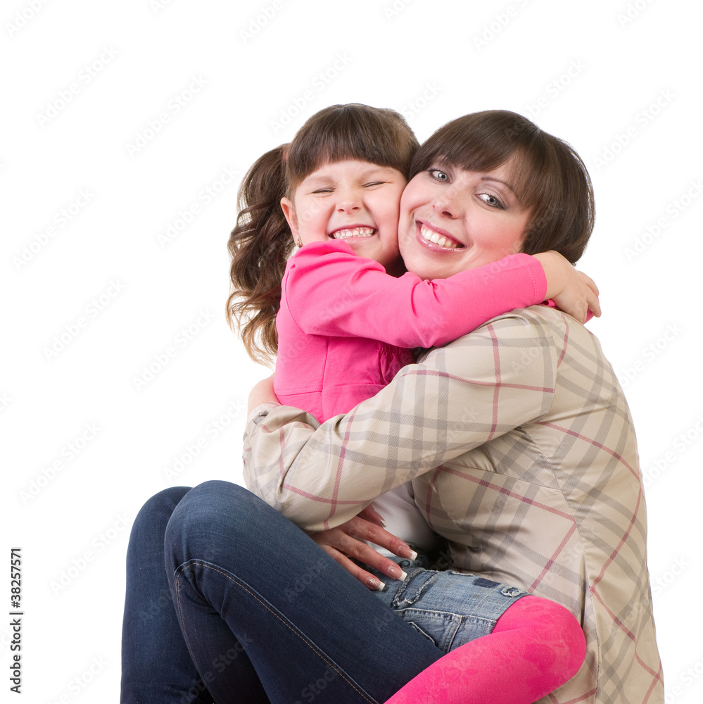 Happy family, mother and her little daughter embracing Happy family, mother and her little daughter embracing