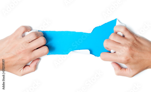 paper torn by woman hands
