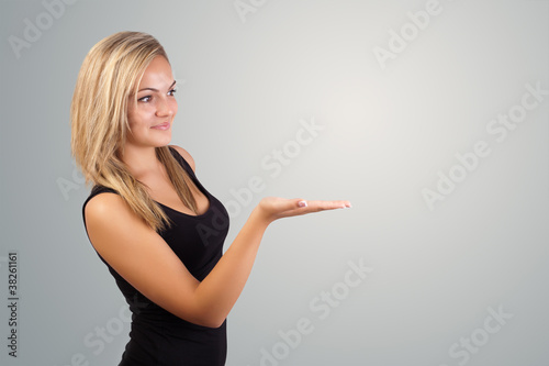 blonde woman presenting hand