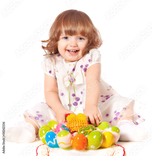 Beautiful girl holding Easter eggs
