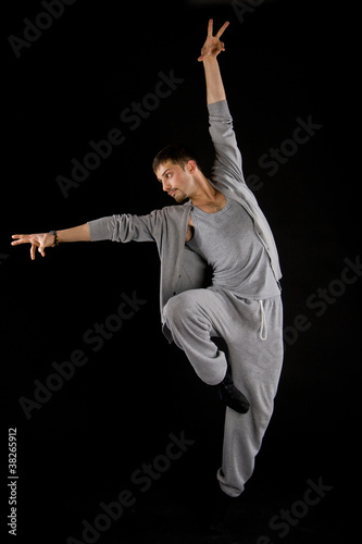 cute stylish dancer in the dance sweatsuit shows