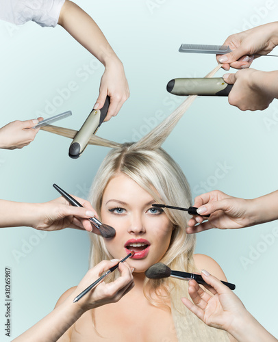 Portrait beautiful white hair girl with makeup brushes near attr photo