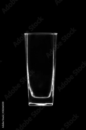 empty glass on a black background.