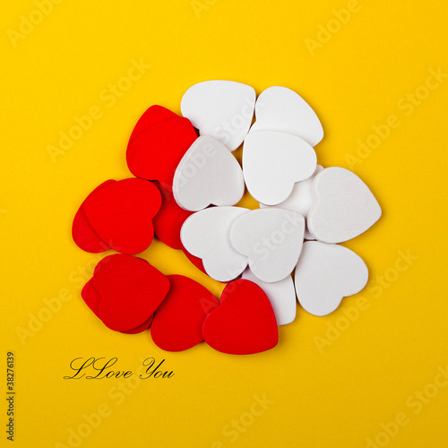 white and red hearts on yellow background
