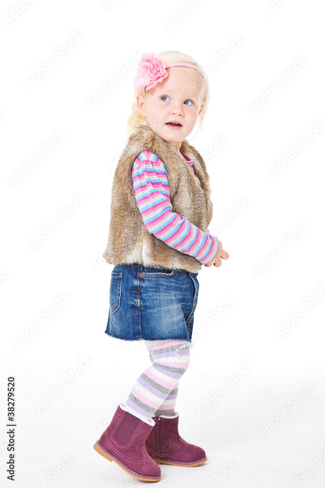 portrait of blonde girl in a fur vest portrait of blonde girl in a fur vest