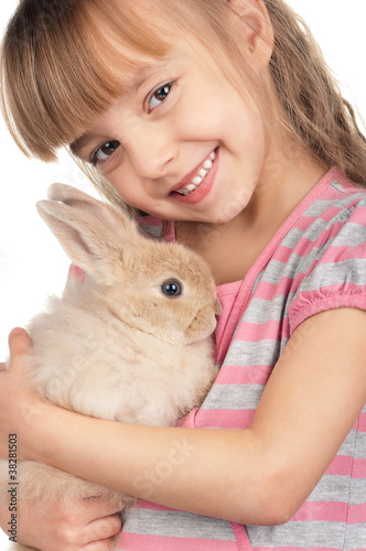 Little girl with rabbit © DenisNata