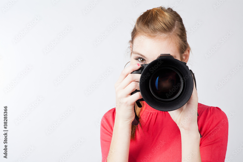 pretty, female photographer with her digital camera pretty, female photographer with her digital camera