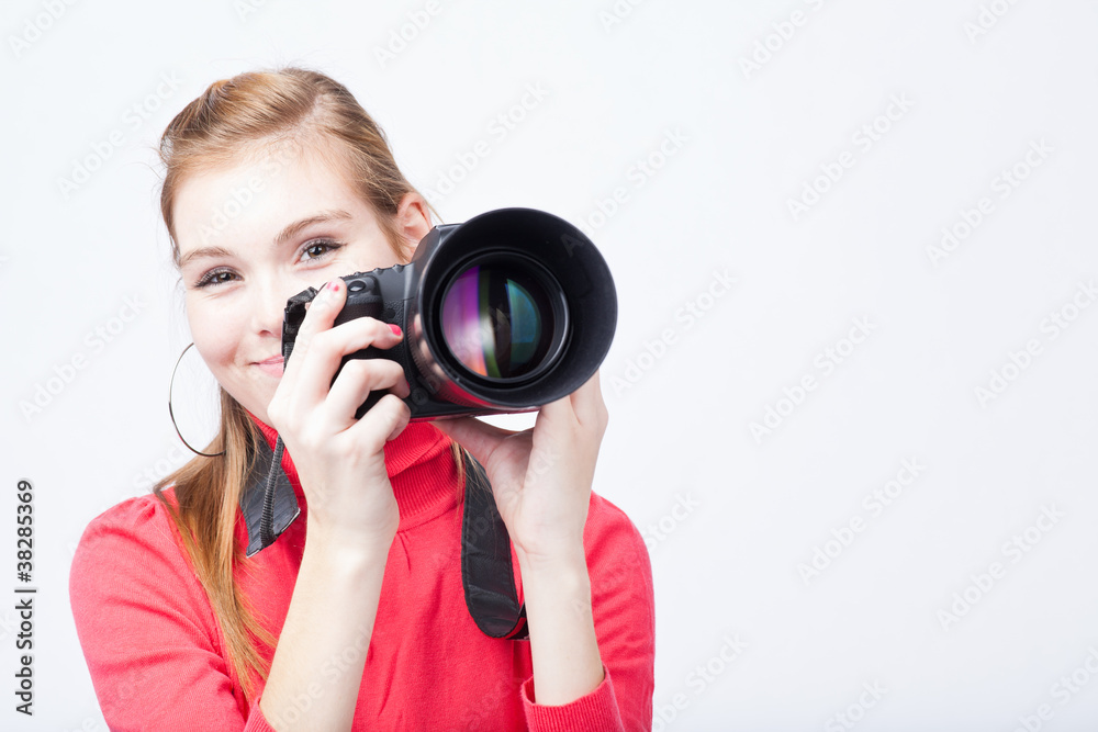 pretty, female photographer with her digital camera pretty, female photographer with her digital camera