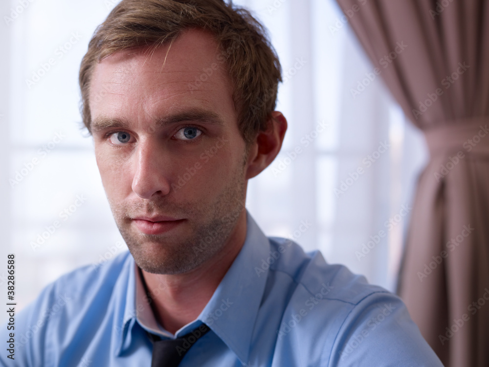 Portrait of serious manager looking at camera Portrait of serious manager looking at camera