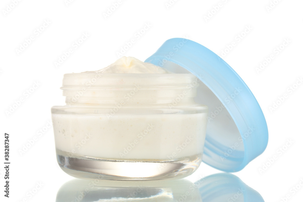 Opened glass jar of cream isolated on white Opened glass jar of cream isolated on white