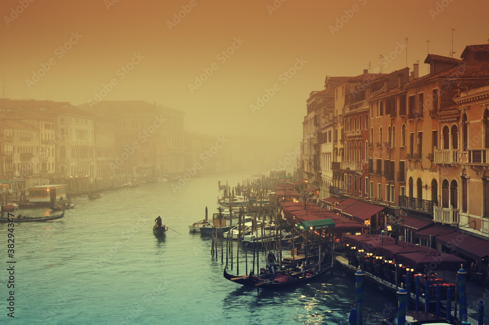 Grand Canal at a foggy evening. Venice - Italy