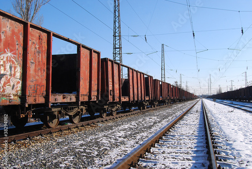 Abandoned freight wagons, railway lines in perspective