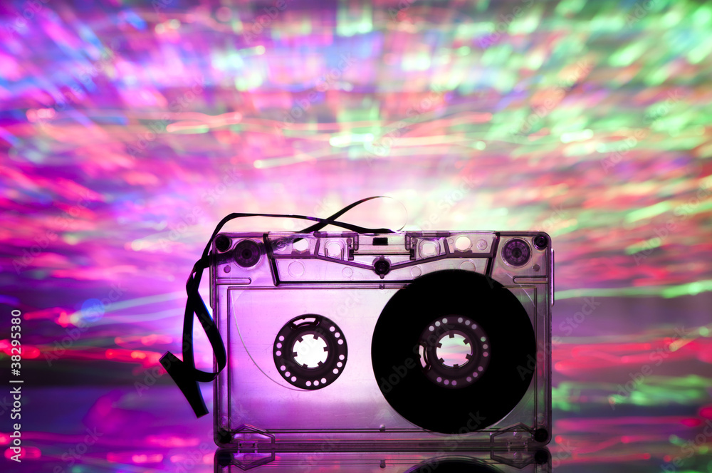 Fototapeta premium Cassette tape and multicolored lights