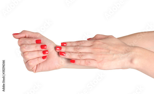 Female hands with manicure isolated on white