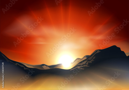 Sunrise or sunset over a mountain range