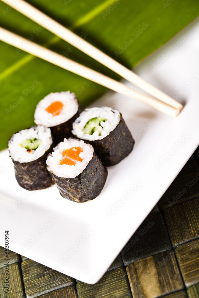 suhi rolls with chopsticks suhi rolls with chopsticks