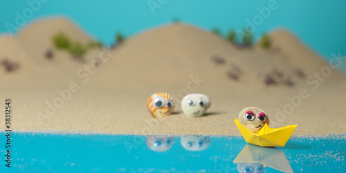 Fototapeta Naklejka Na Ścianę i Meble -  funny sea shells in a miniature landscape