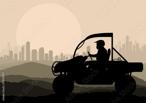 All terrain vehicle rider in desert skyscraper city landscape