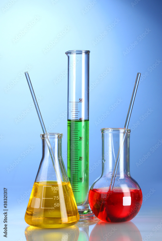 Three flasks with color liquid with reflection Three flasks with color liquid with reflection