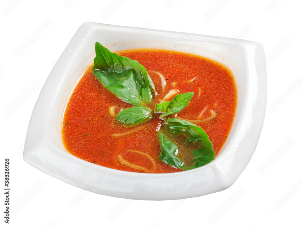 Tomato soup in ceramic bowl