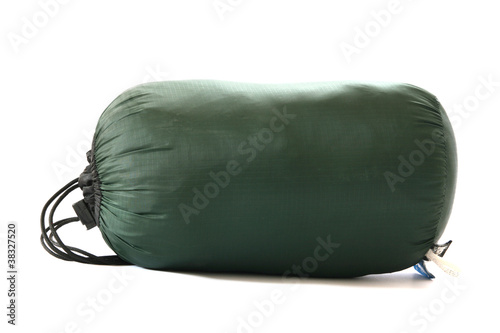 Fotografía Packed sleeping-bag on white background
