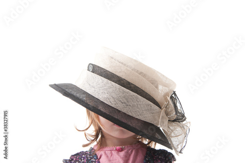 Фотография Child playing dress up isolated against white background