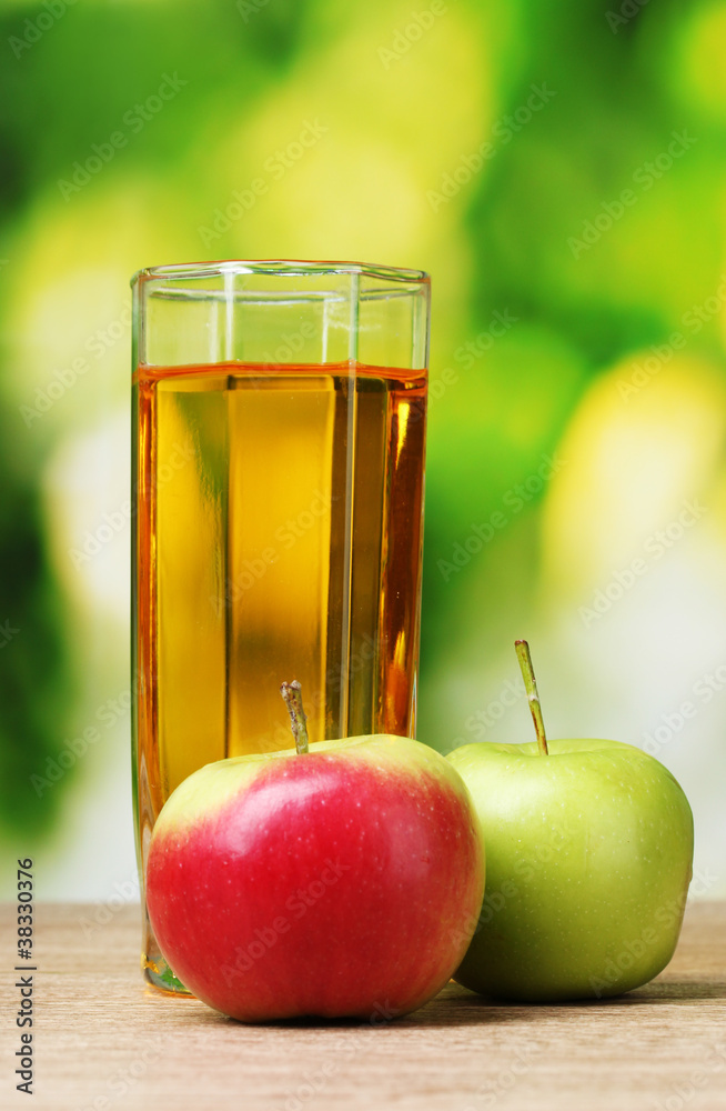 Healthy organic apple juice on table Healthy organic apple juice on table