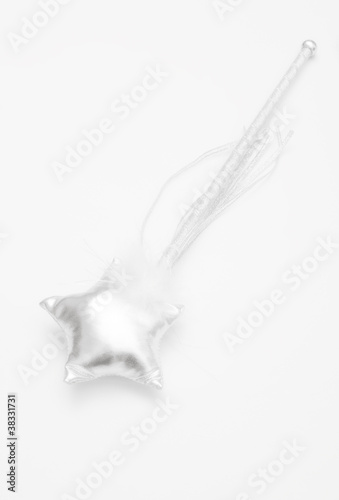 Bacchetta magica carnevale su fondo bianco photo