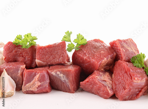 isolated raw fresh beef cubes