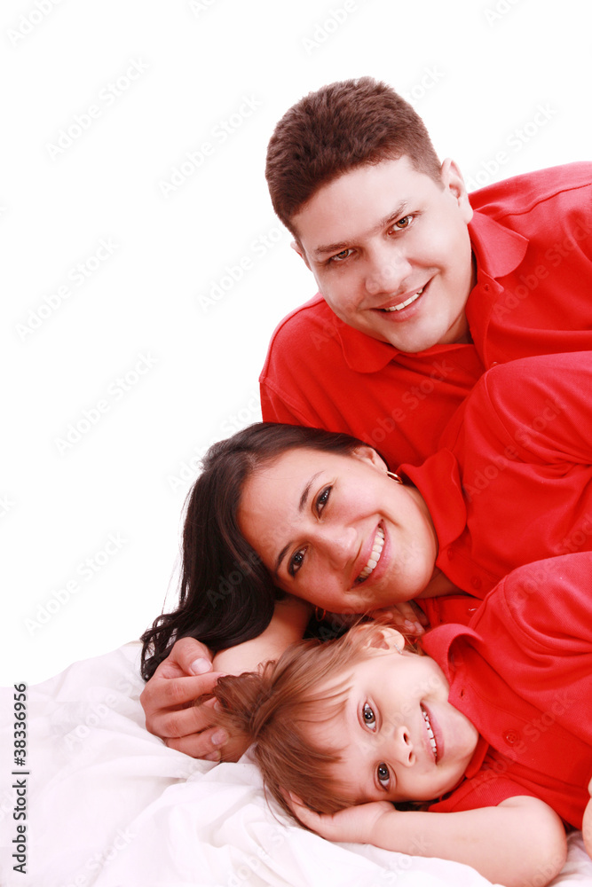 A family portrait of mom, dad and their daughter; isolated on th A family portrait of mom, dad and their daughter; isolated on th