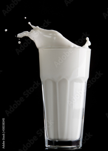 milk splash on black background