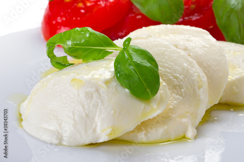 Mozzarella cheese with basil and olive oil